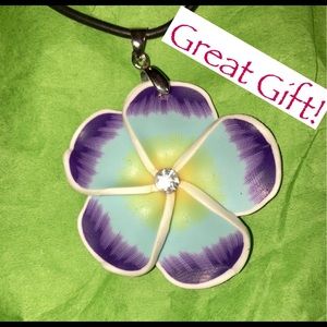 Exquisite blue and purple pansy flower pendant.